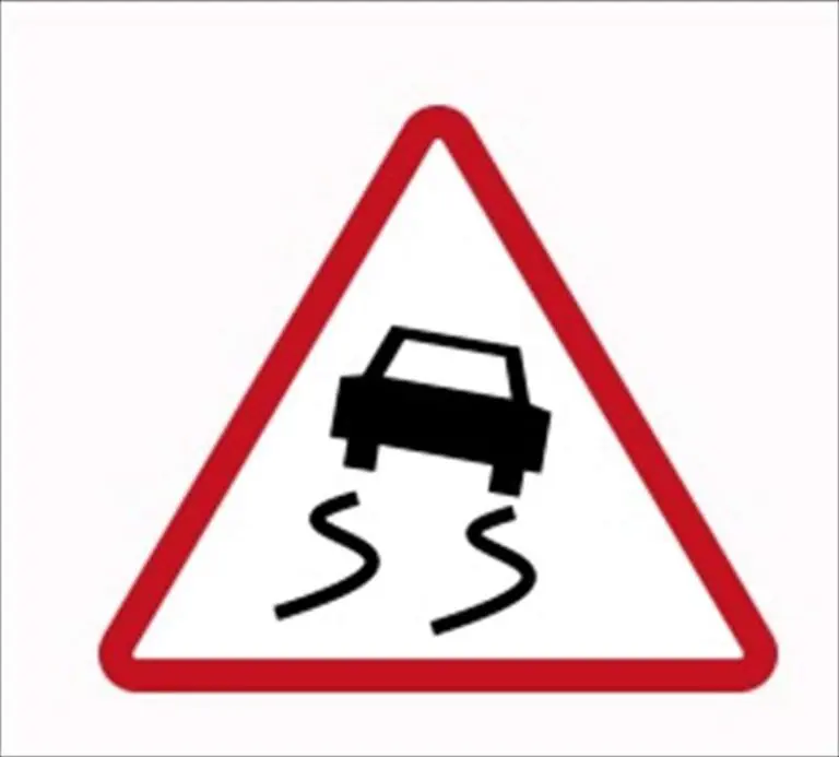 The driver is approaching a slippery road